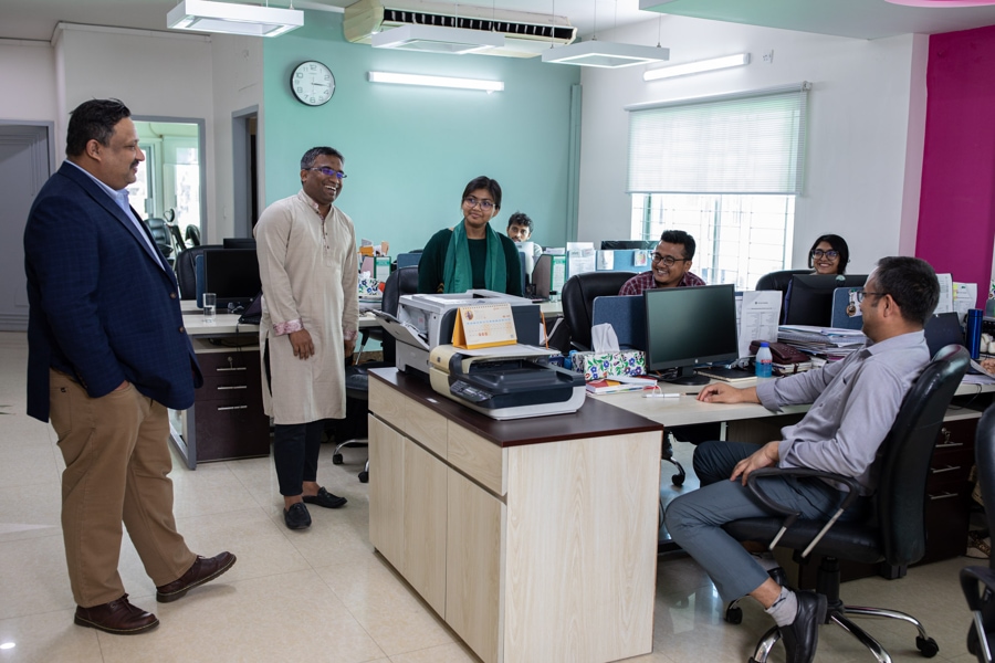 Kazi Faisal Bin Seraj (left) along with a few of his collegues at the Asia Foundation Bangladesh office 