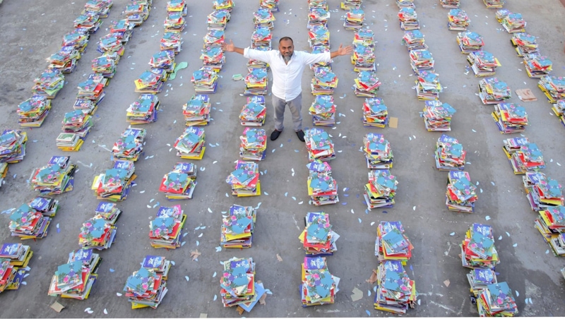 Waliullah Bhuiyan with 20000 books to set up 102 school library on his office rooftop