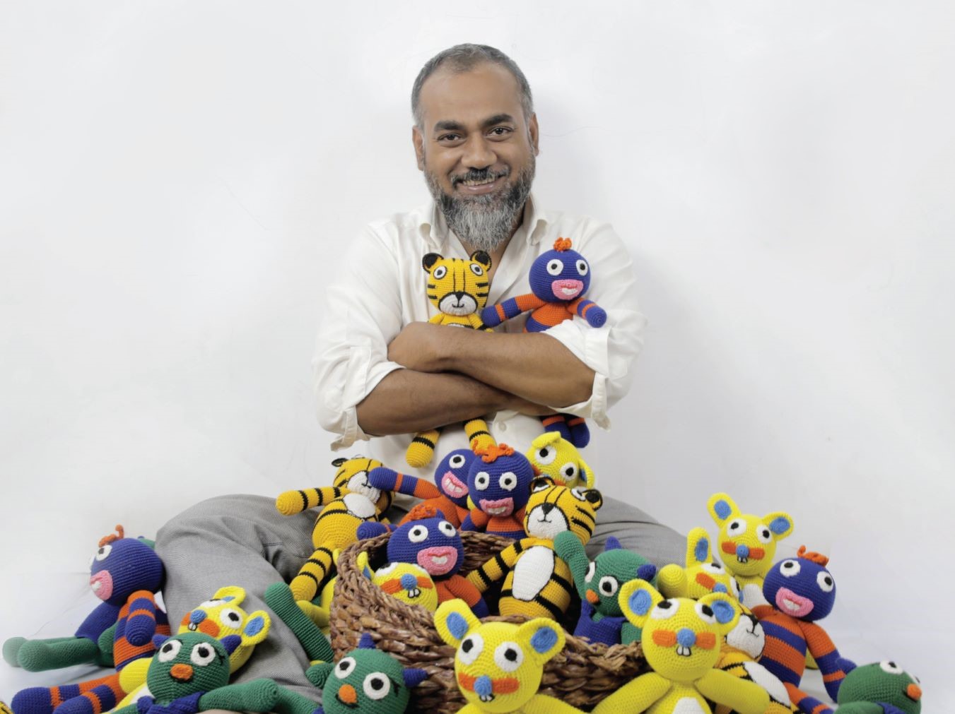 Waliullah Bhuiyan with his goofi toys made from safe eco-friendly materials