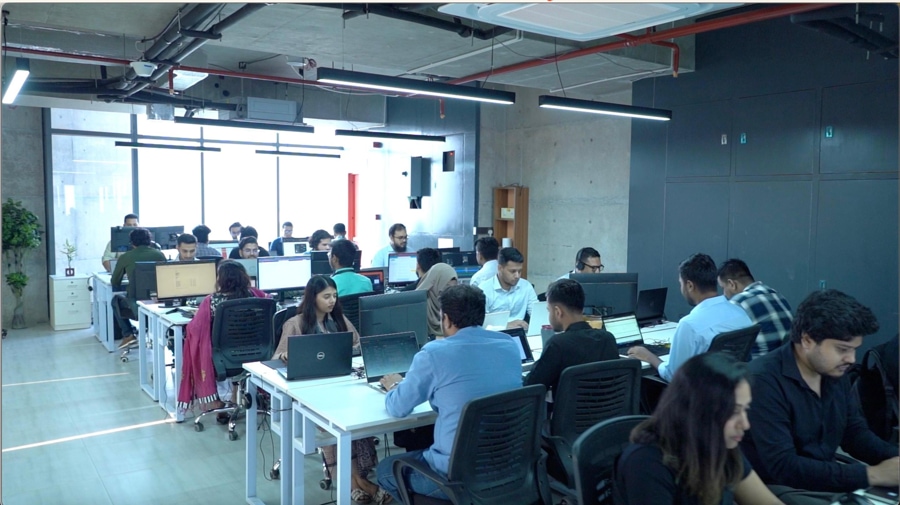 A snapshot of Qormotho people busy working at its office in Dhaka