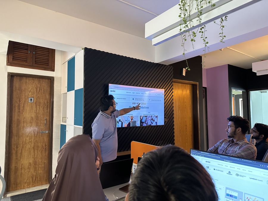 Hubxpert CEO Ratul Rahman speaking with part of the Hubxpert team