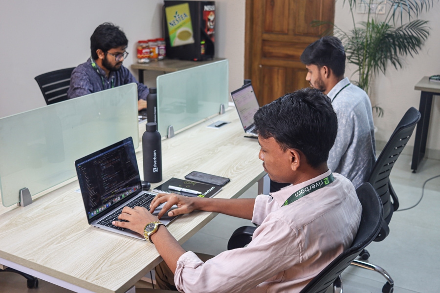 Riverborn team members at desk